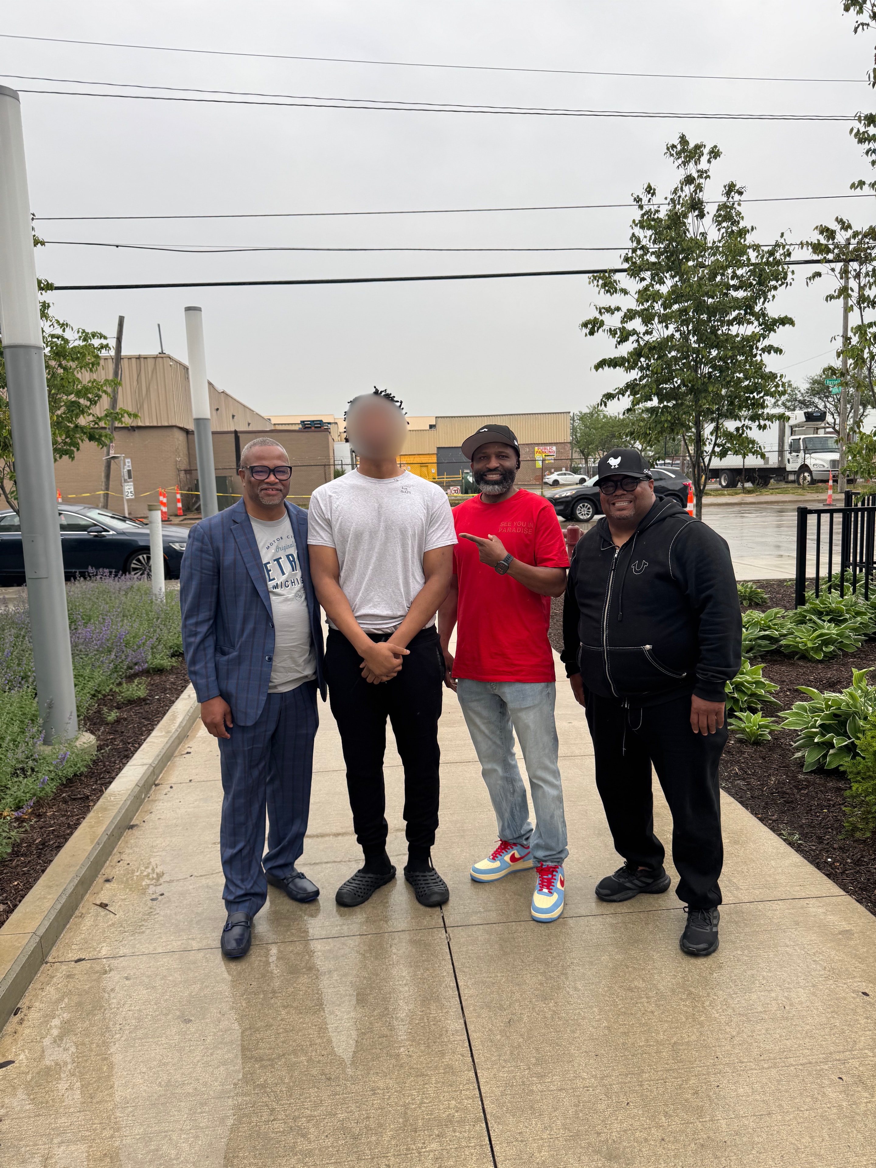 FTGF staff walking alongside a youth after release, providing post-release support and presence